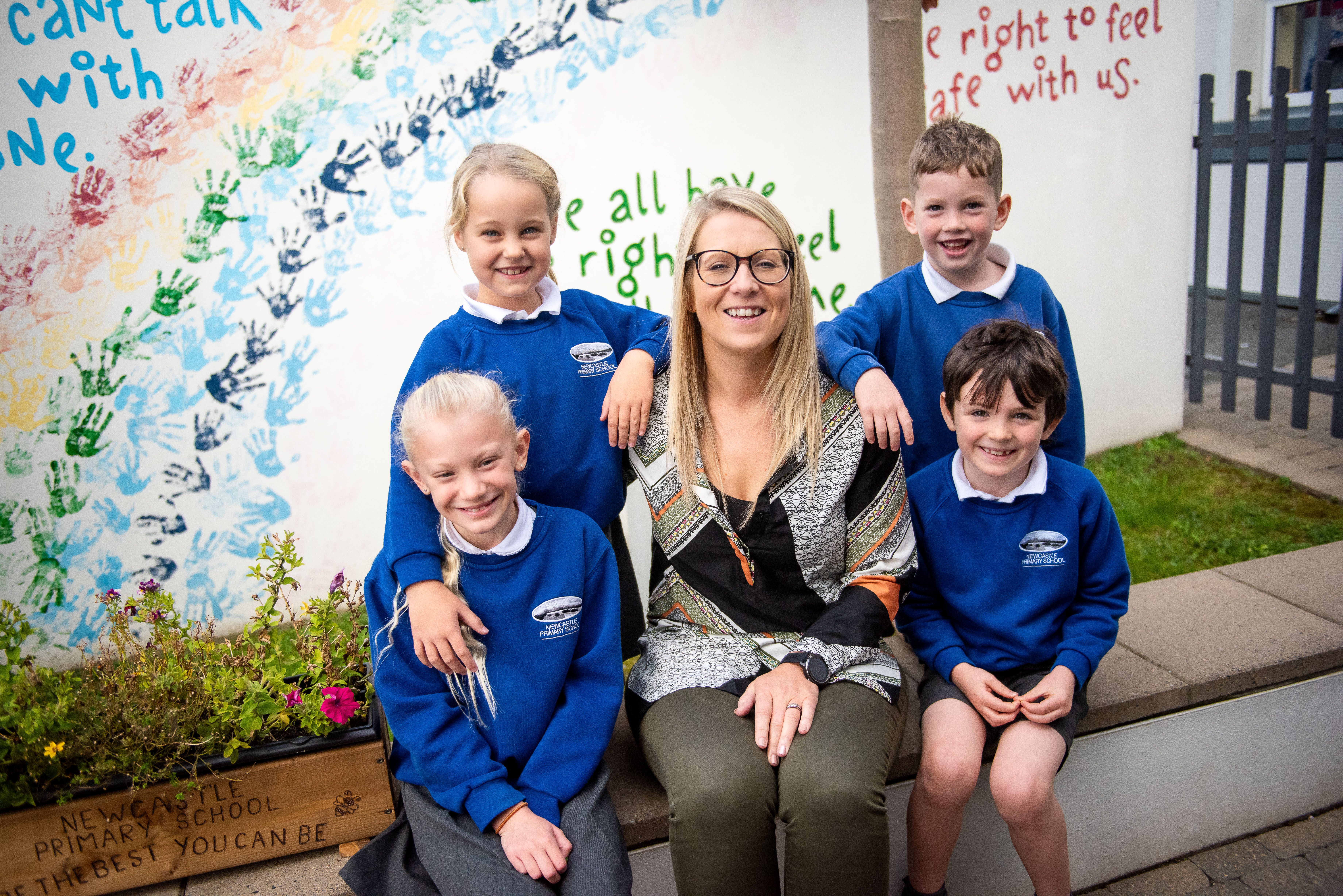 Mrs Stewart, Mrs Crutchley, Mrs Baines, Mrs Hanna, Mrs McKee, Mrs Kincaid and Mrs Woods have been trained to deliver the Helping Hands programme.